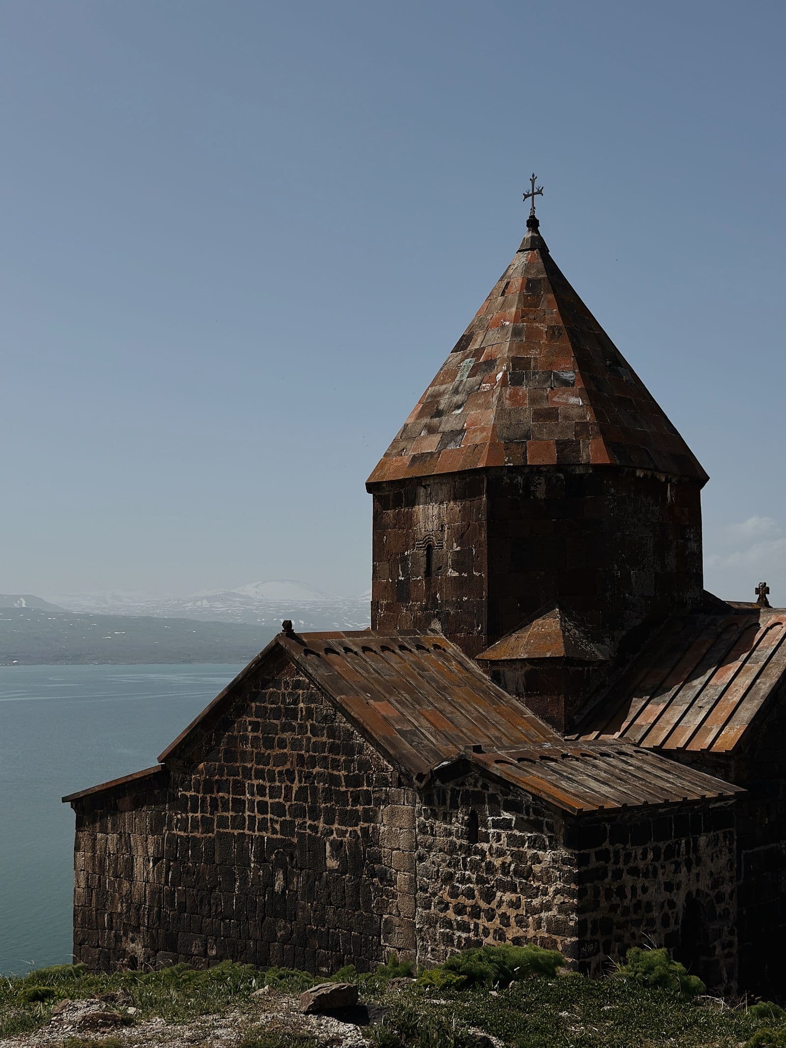 Sevanavank monastery on its peninsula above the blue of Lake Sevan